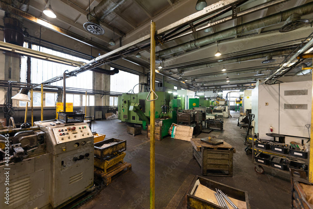 Photo shot of automobile assembly production.Car factory. Auto parts. Engine factory. Plant concept and interior Photo shot of automobile assembly production.Car factory. Auto parts. Engine factory. Plant concept and interior