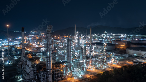 Chemical industry storage tank and oil refinery in Industrial Plant at night over lighting  Fuel and power generation  petrochemical factory industry zone