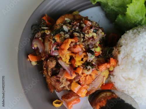 photo of fried chicken with sambal matah photo