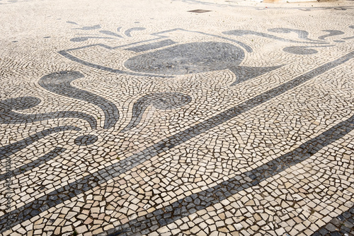 Traditional style Portuguese Calcada Pavement for pedestrian area in Faro, Algarve, Portugal	
