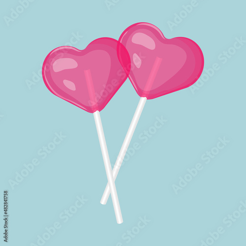 Pair of pink heart shaped lollipops vector illustration