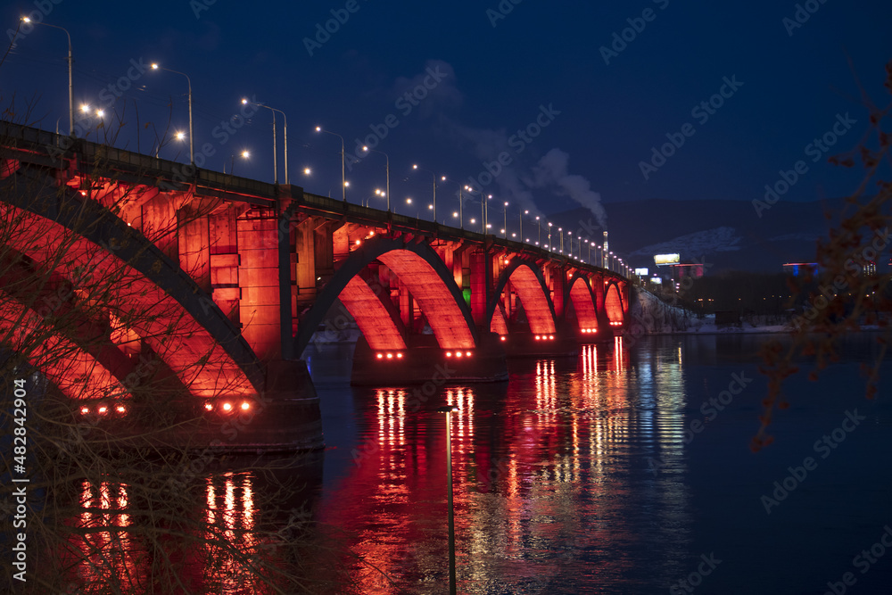 illuminated river bridge