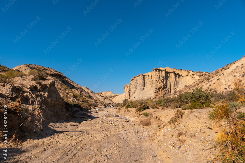 Tabernas desert trail, Almería province, Andalusia. On a trek in the Rambla del Infierno