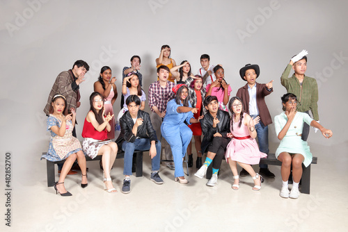 Young aisan large group of man woman drama acting theatre student performing rehearsal expression pose