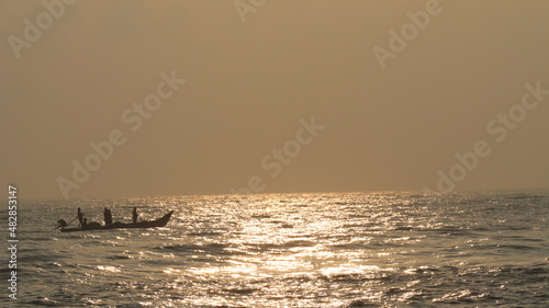 early morning fishing by fishermen in the bay of bengal