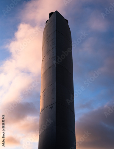 Industrial Smoke Stack, Funnel, Tower with pink sunset clouds in the background - Glasgow, Scotland 