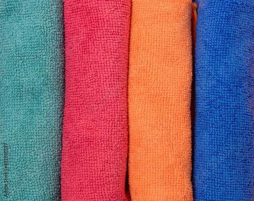 Colored Microfiber Napkins for Cleaning a Top View on a Pink Background Horizontal Close Up