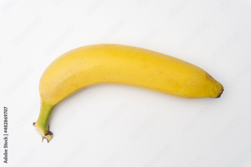 Single banana isolated on white