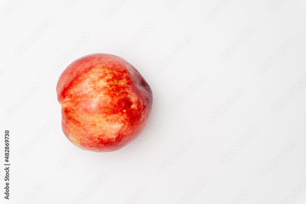 Ripe nectarine fruit, isolated on white background Ripe nectarine fruit, isolated on white background