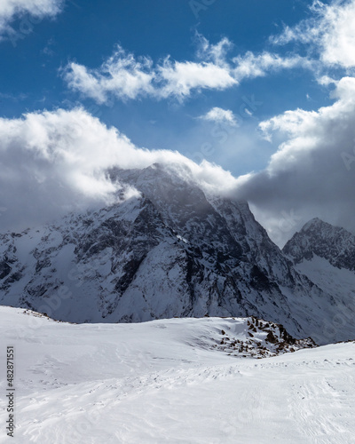 Mountain top surrounded by clouds. Greater Caucasus ridge © Maksim