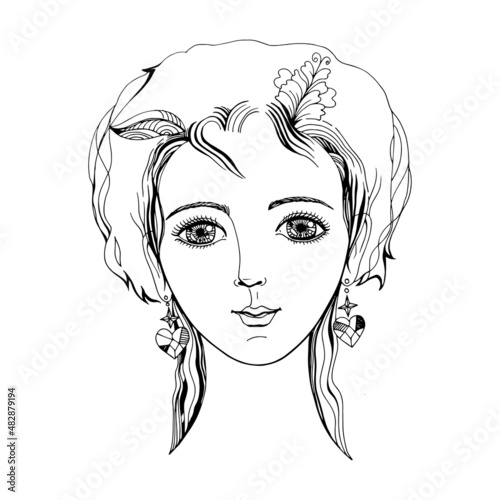 Beautiful face of a girl with a nice hairstyle and earrings.