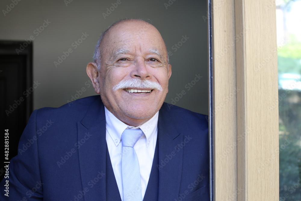 Senior bald businessman with a mustache Senior bald businessman with a mustache