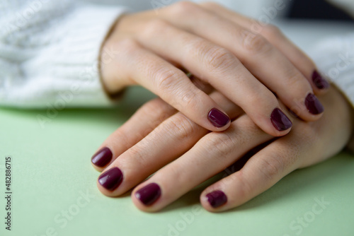 Relaxed hands with freshly manicured nails