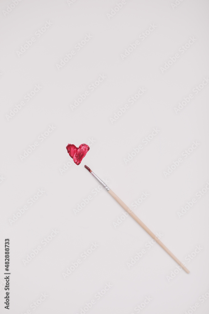 Heart symbol made of red brush strokes on white background. Valentine's Day, Woman Day composition. Heart symbol made of red brush strokes on white background. Valentine's Day, Woman Day composition.
