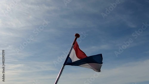 Dutch flag hanging from a ship