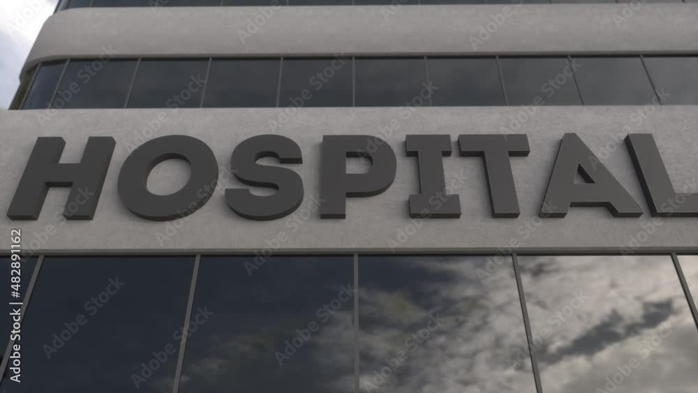 Health care hospital sign and modern building exterior. Health, clinic, emergency, healthcare and medical concept Health care hospital sign and modern building exterior. Health, clinic, emergency, healthcare and medical concept