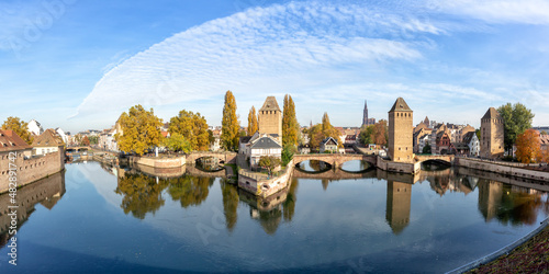 La Petite France with bridge over river Ill water tower panorama copyspace copy space Alsace in Strasbourg  France