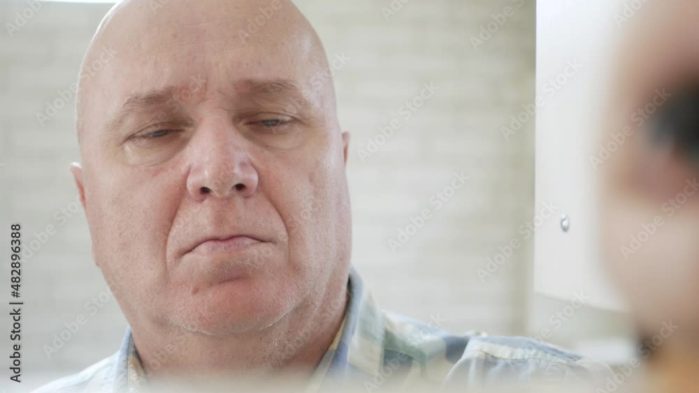 Smoker Opens an Empty Office Cabinet Door and Puts Inside a Cigarette and a Lighter. Elderly Person Putting a Cigarette in a Cupboard.