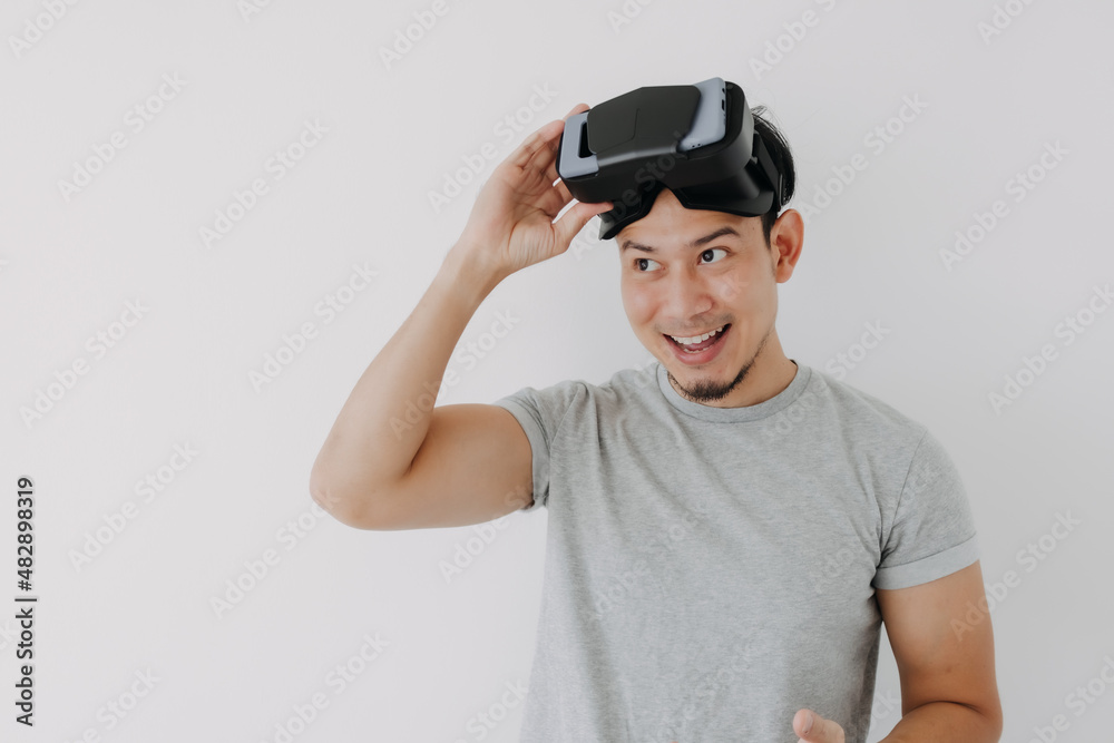 Happy Asian man present virtual glasses application for metaverse technology. Happy Asian man present virtual glasses application for metaverse technology.