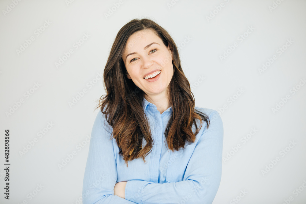 Woman wearing blue shirt and smiling. Job advertisement for young people. job announcement.	