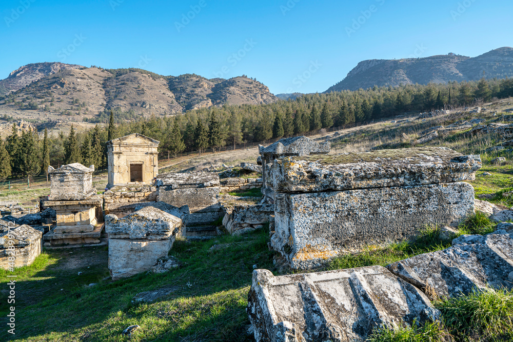 The necropolis of Hierapolis is filled with sarcophagi, rock tombs, was an ancient Greek city located on hot springs in classical Phrygia in Anatolia and currently comprise an archaeological museum.