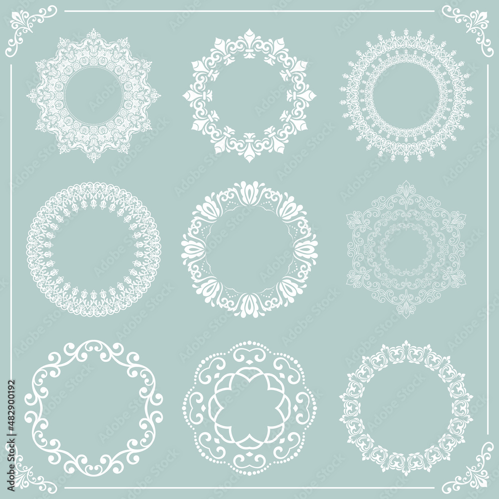 Vintage set of round elements. Different elements for design frames, cards, backgrounds and monograms. Classic patterns. Set of vintage round white patterns