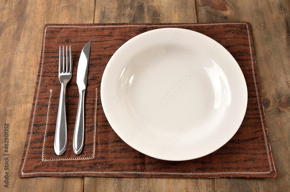 empty plate served at the table