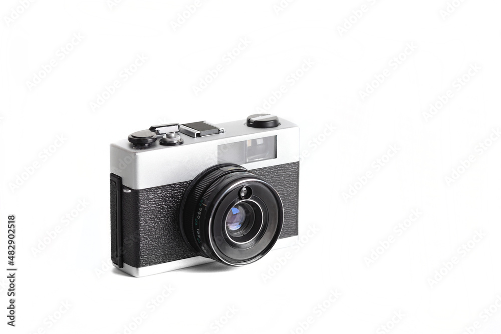 The old automatic camera on white background.