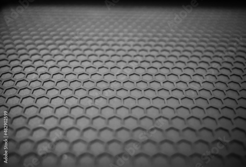 Perforated futuristic carbon texture background