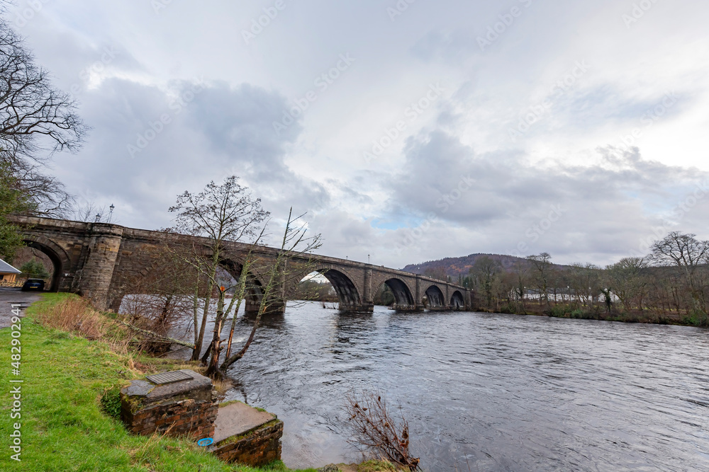 Overcast view of the old Dunkeld Bridge in Dunkeld old town Overcast view of the old Dunkeld Bridge in Dunkeld old town