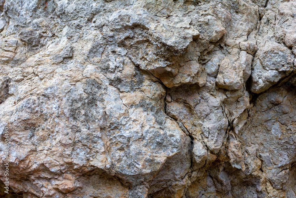 Natural natural stone, stone tunnel of a mountain river ,inert material used for construction work and decorative decoration, close-up.