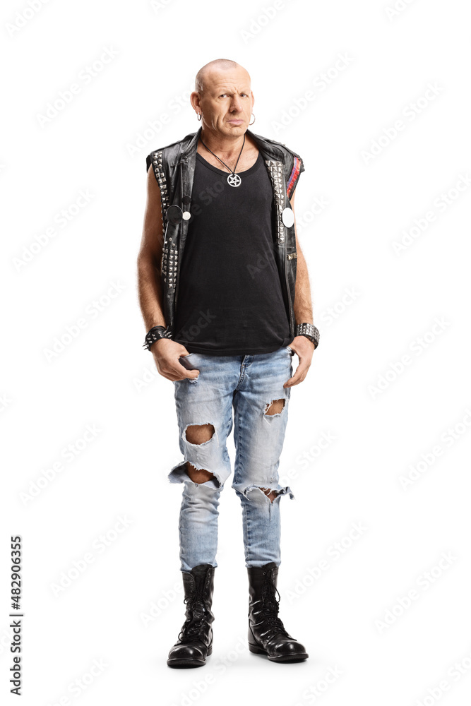 Bald man wearing jeans and leather vest