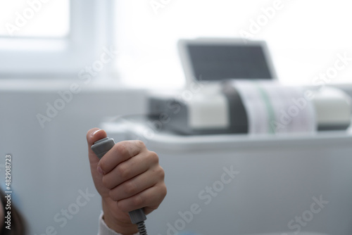 Close Up Pregnant Woman On Hospital Couch During Medical Control Cardiotocography. Visit Gynecologist Doctor At Clinic For Pregnancy Consultant. Examine Expectant Belly Baby Mother Healthcare Check Up photo