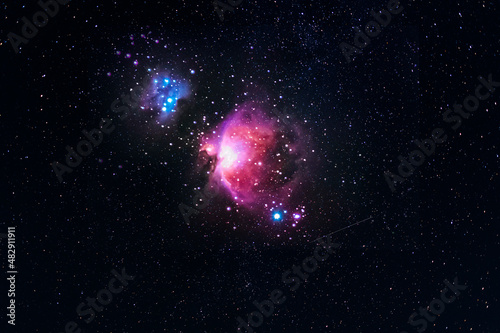 Great Orion Nebula  on the starry sky. Astronomical background, deep space.