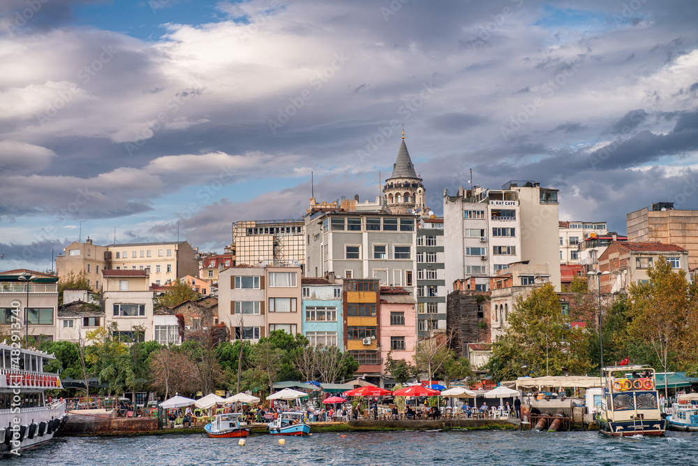 INSTANBUL - OCTOBER 23, 2014; Buildings of Galata over the Golden Horn river.