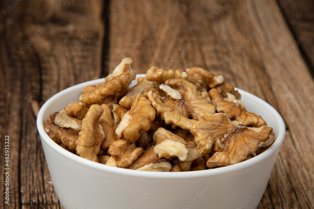 Walnuts on a wooden background.A natural protein product.
