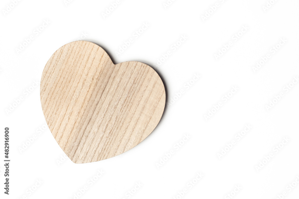 Fototapeta premium a heart-shaped board on a white background
