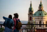 Couple traveling the world and sightseeing at sunset