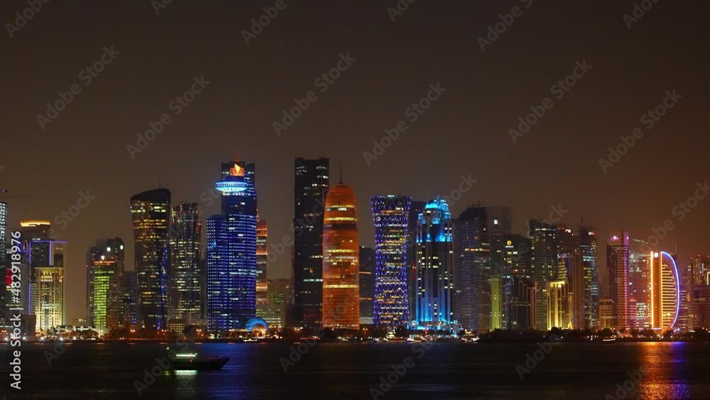 Doha West Bay skyscrapers skyline view from mia park at night
Doha West Bay skyscrapers skyline view from mia park at night