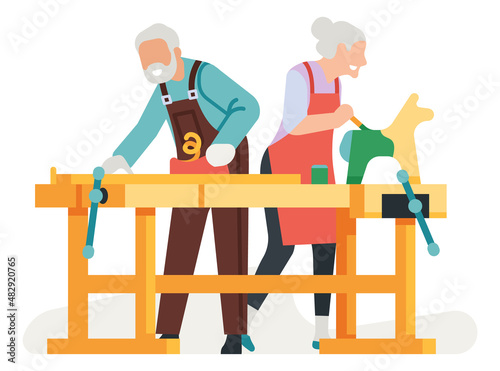 Seniors woodworking. Old people making wood toys. Elderly activity