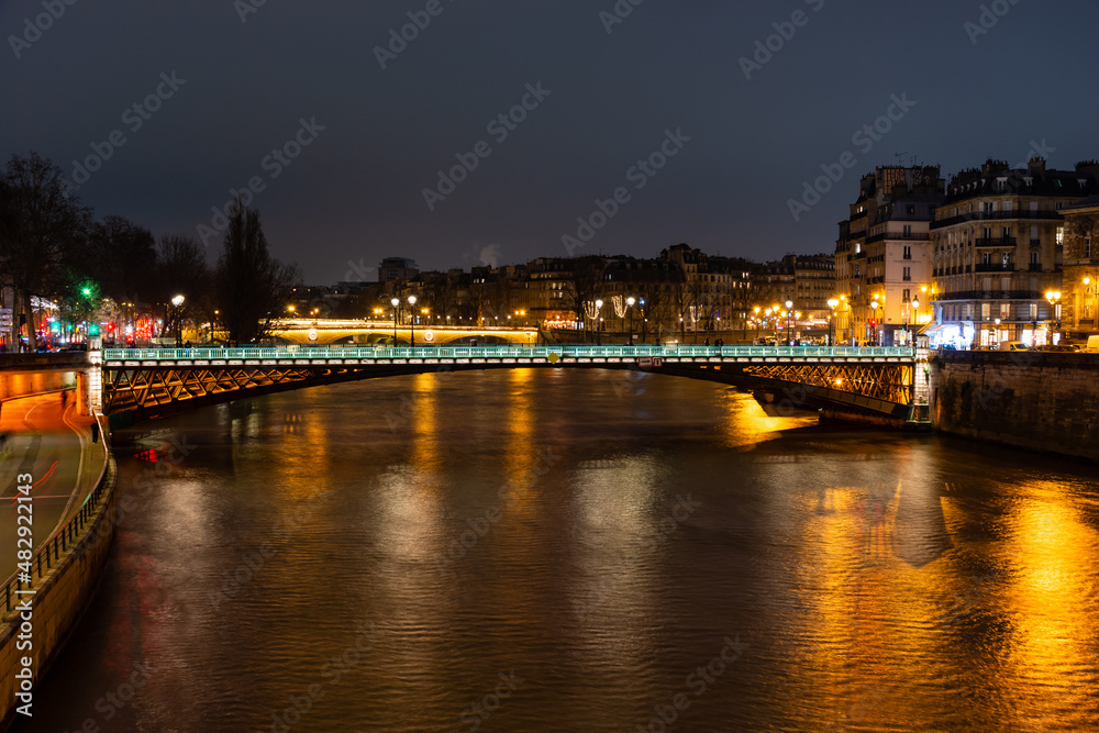 Night Paris, Akrol bridge, reflection of lights in the river Seine, cityscape
