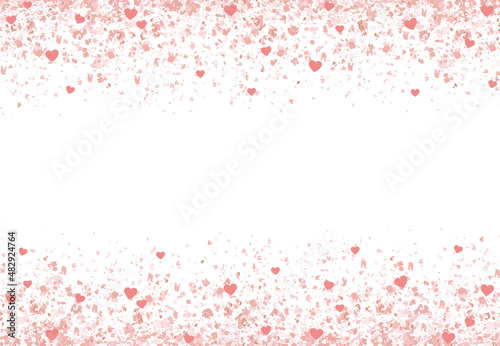 A pink glitter confetti border with hearts and copyspace on white
