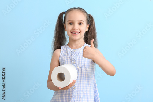 Funny little girl with roll...