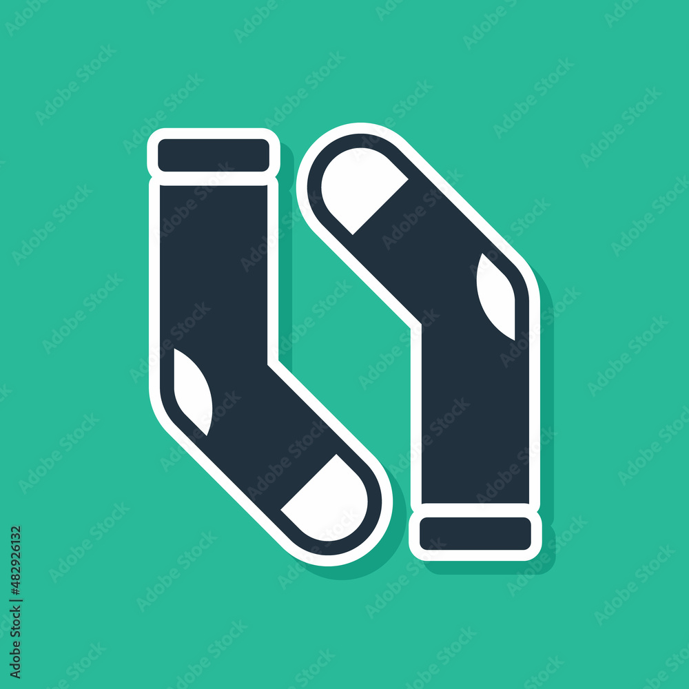 Blue Socks icon isolated on green background. Vector Blue Socks icon isolated on green background. Vector
