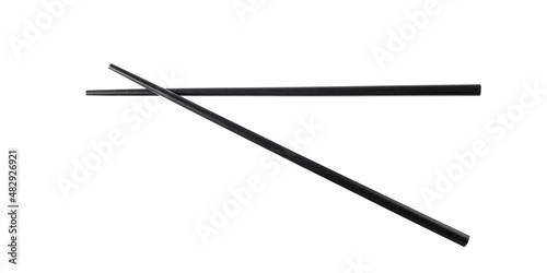 Black wooden chopsticks flying isolated on white