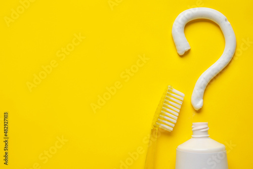 Toothbrush, opened tube and...