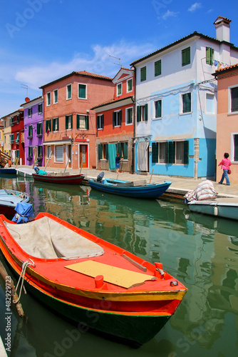 Boat anchored in canal in Burano, Venice, Italy © donyanedomam