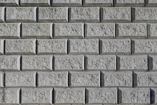Close up of a gray concrete block wall.