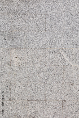 Close up of a wall of granite tiles