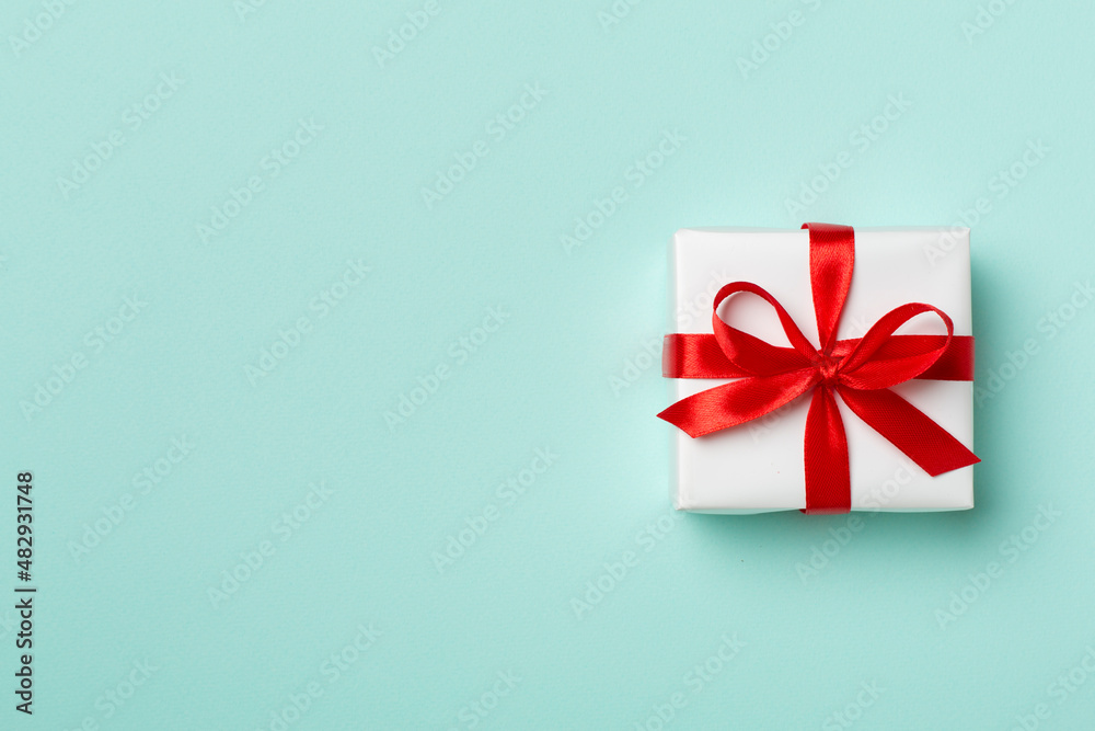 Top view of gift box on color background